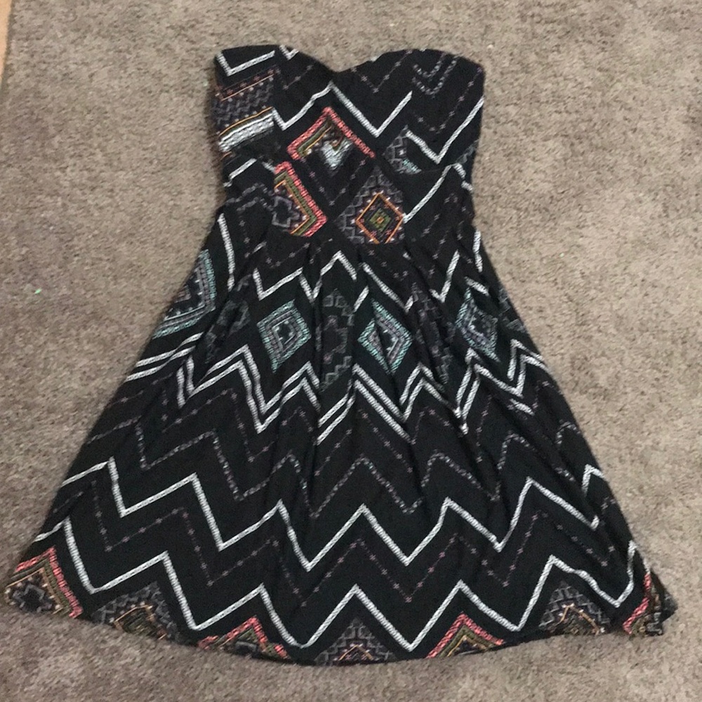 Strapless, thigh high dress.